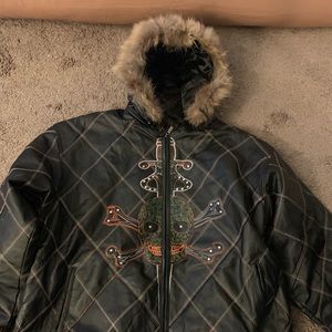 Leather jacket with custom stitching and fur hoody